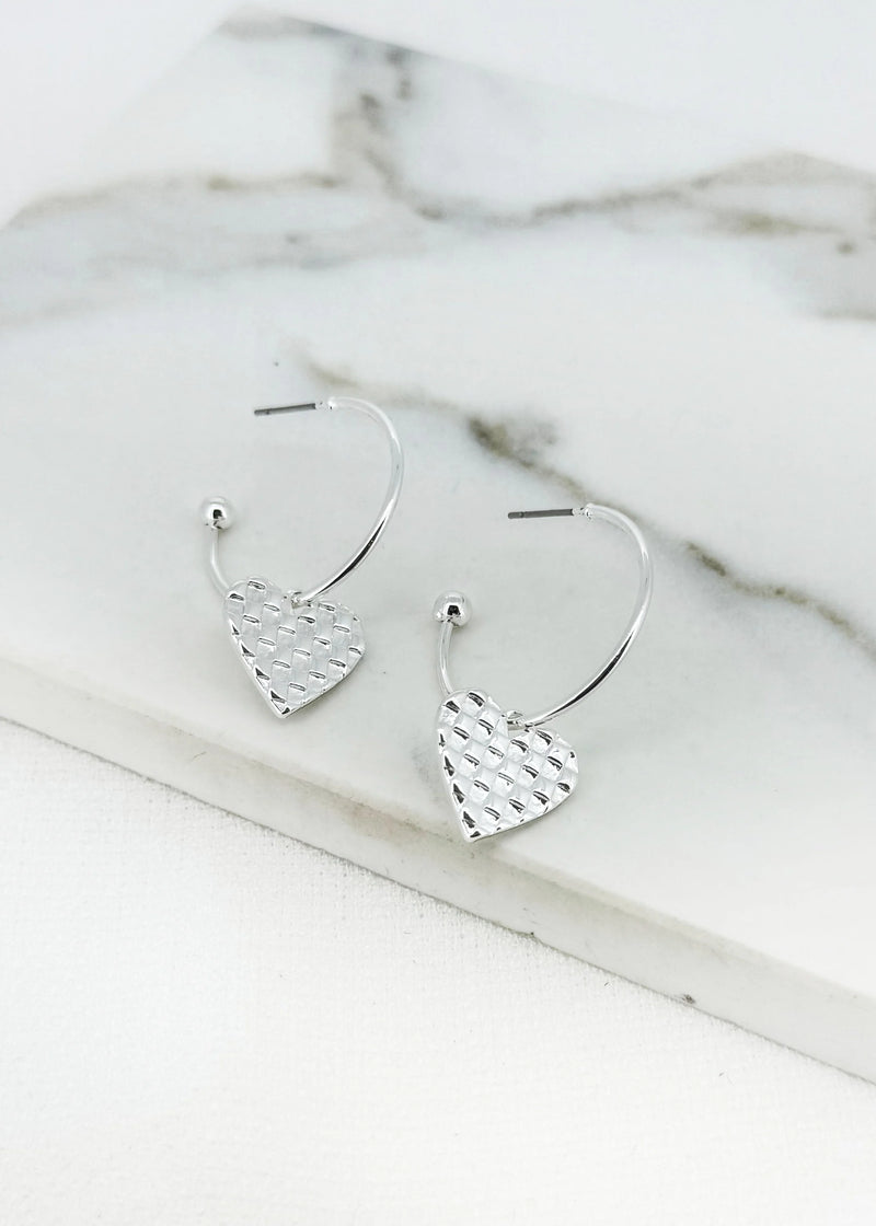Silver hoop with textured hart charm earring