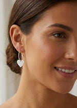 Silver hoop with textured hart charm earring