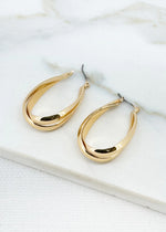 Large gold cross over hoop earring