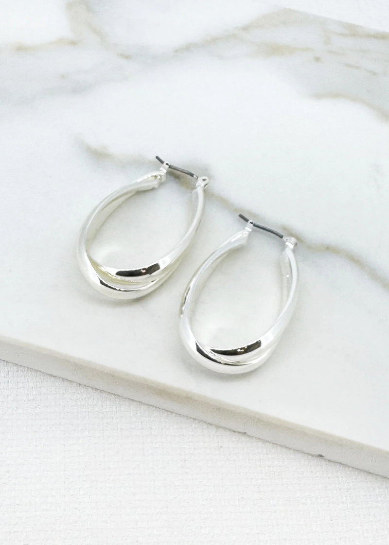 Large silver cross over hoop earring