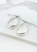 Large silver cross over hoop earring