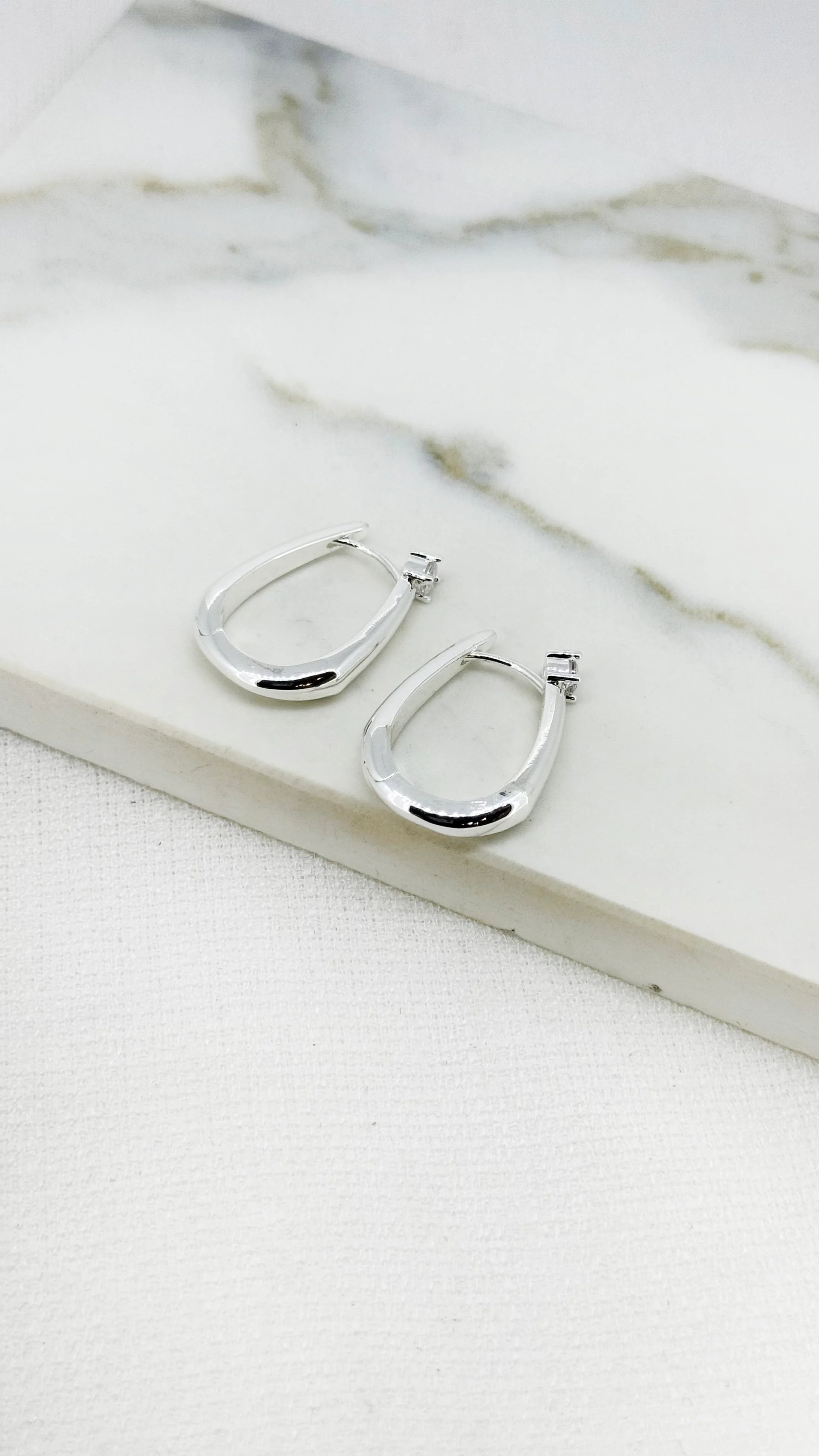 Silver hoop earring