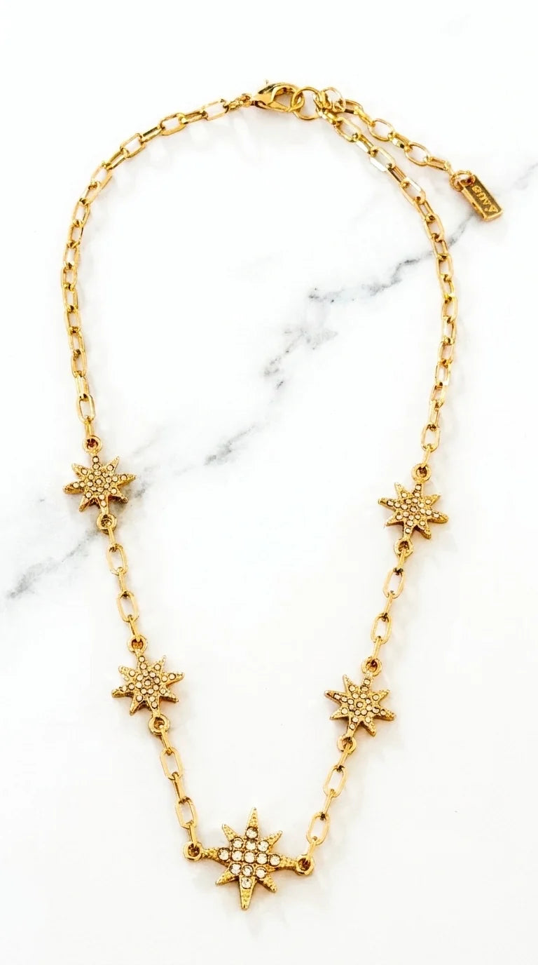 Short gold necklace with diamante star detail