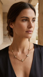Short gold necklace with diamante star detail