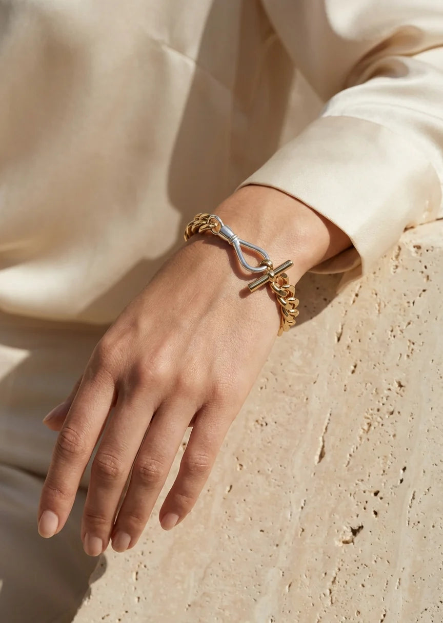 Gold chain bracelet with silver hock an gold T-bar