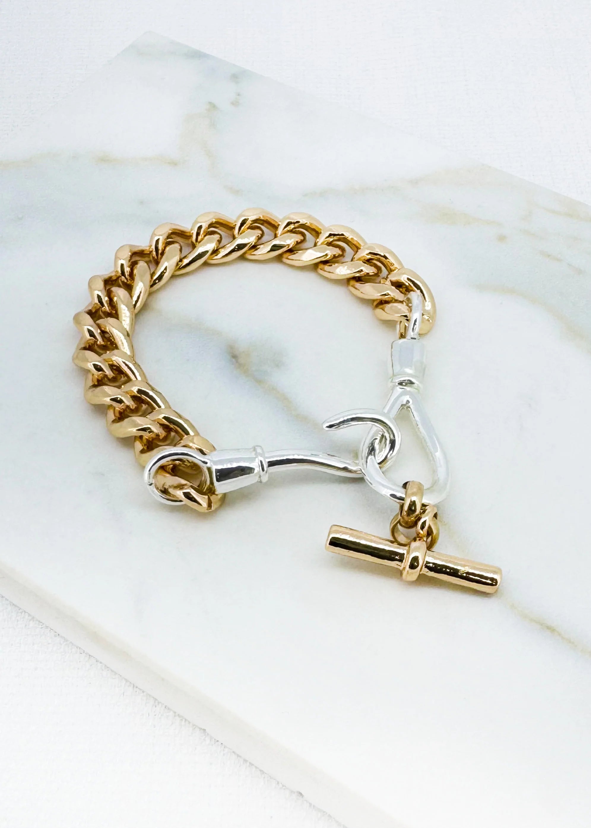 Gold chain bracelet with silver hock an gold T-bar